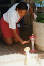 Elizabeth trying out a new new "safe" candle device